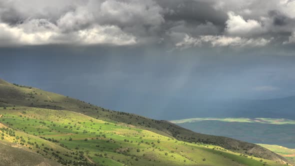 Heavy Rain Coming From Behind the Hill