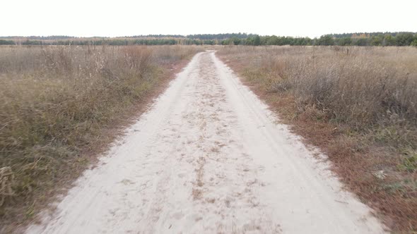 Ukraine Kyiv Region  Road Through an Empty Field