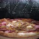 Delicious Fresh Italian Pizza On A Black Background With The Effect Of Light Inscription Pizza - VideoHive Item for Sale