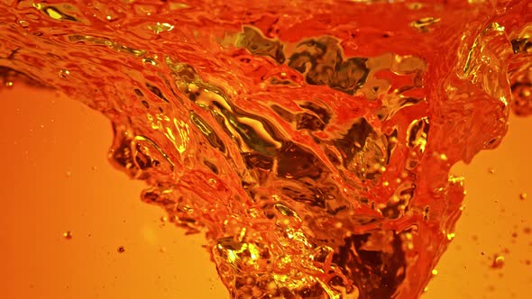 Super Slow Motion Shot of Golden Liquid Vortex at 1000 Fps