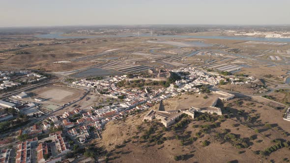 Panoramic view of Castro Marim town and Castle. Salt works and Guadiana river. Aerial view