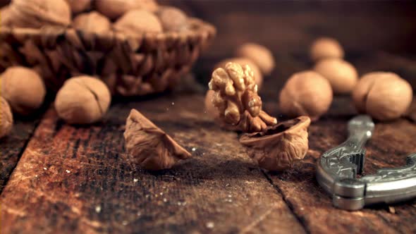 Super Slow Motion on the Table Falls Walnut and Splits