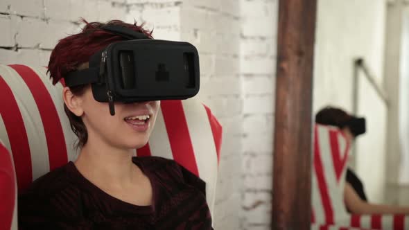 Young Woman Using Virtual Reality Headset