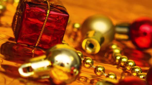 Christmas Decor in Red and Gold on Shiny Paper Closeup