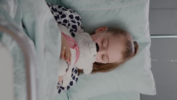 Vertical Video Portrait of Tired Sick Child Sleeping After Suffering Medical Recovery Surgery