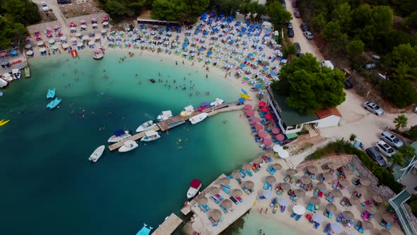 Albania view from the drone shooting on the beach beach with umbrellas