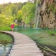 Woman Walking in Plitvice Lakes National Park - VideoHive Item for Sale