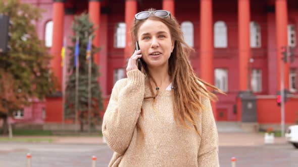 Hipster Girl Has Phone Conversation