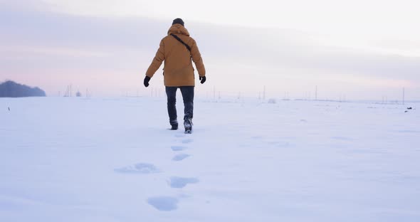 Man Go Away in a Snow Field