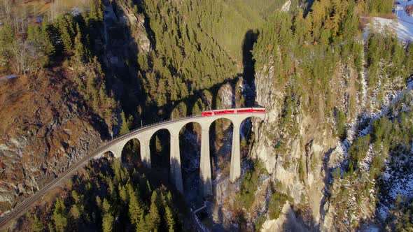 A Swiss Train Passing Over the Landwasser Viaduct