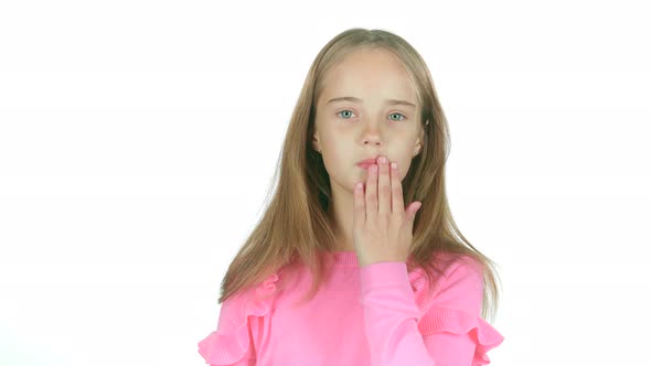 Child Sends an Air Kiss. White Background. Slow Motion