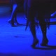 Feet of Dancing People on the Dance Floor at a Party in a Dark Bar in the Spotlight - VideoHive Item for Sale