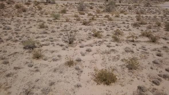 Drone flying over desert  and desert road