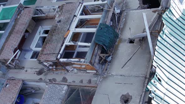 Vertical Video of the Consequences of the War in Ukraine  a Destroyed Residential Building