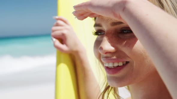 Woman looking away on the beach