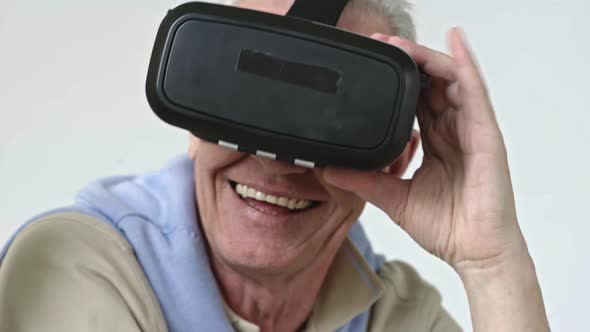 Senior Man Experiencing Virtual Reality