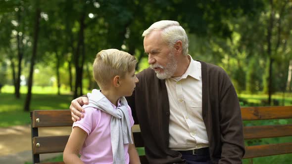 Grandfather Telling Secrets to Kid, Sharing Life Experience, Tips for Real Men