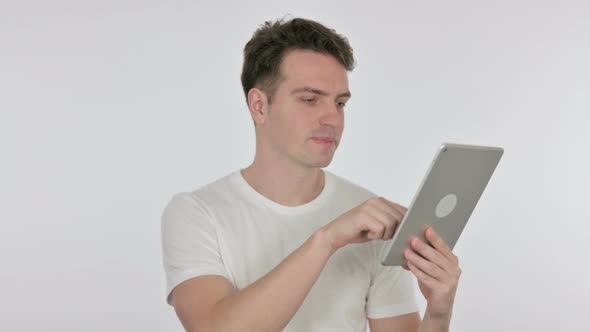 Young Man Using Digital Tablet on White Background