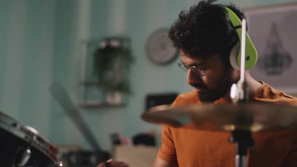 Indian Guy Playing Rhythm on Drums