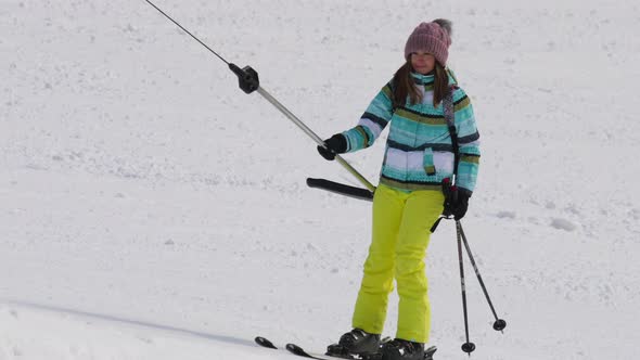 Amateur Skier Girl on a Lift