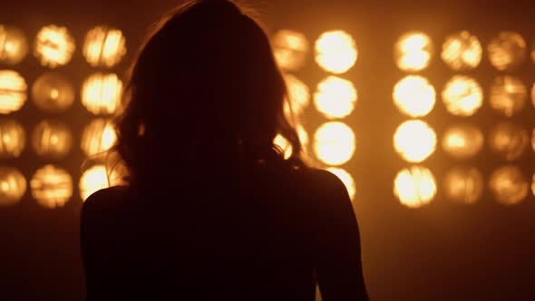 Silhouette Professional Woman Vocalist Performing in Night Club Lights Close Up