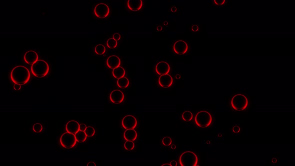 Oil red drops moving in water