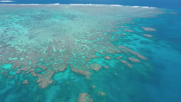 Great Barrier Reef landscape aerial of colorful coral and turquoise ocean, near Cairns, Queensland,