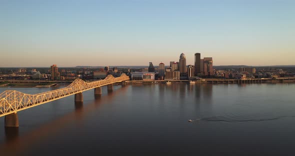 Louisville, Kentucky skyline view with bridge with drone video moving down.