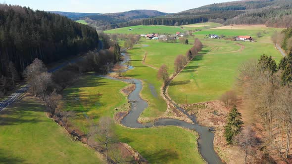 natural river flowing down the valley