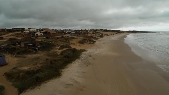 Aerial view of coastal village and beach