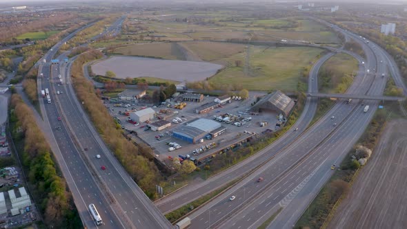 A Freeway Depot Sat Between Highways at Sunset