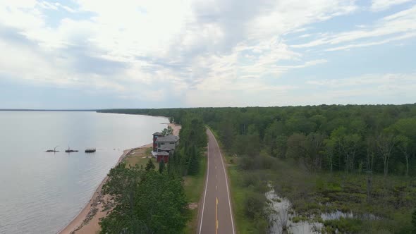 Aerial view of a road next to Lake Superior, highway scenic drive, Madeline island wisconsin