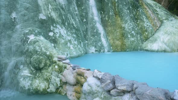 Geothermal pool and hot spring in Tuscany, Italy. Bagni San Filippo natural thermal waterfall in the