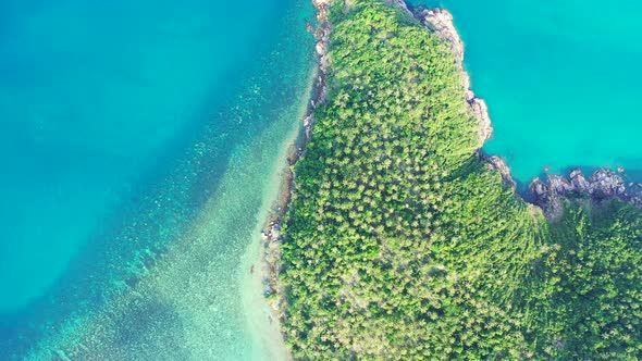 Beautiful birds eye clean view of a white paradise beach and aqua turquoise water background in hi r