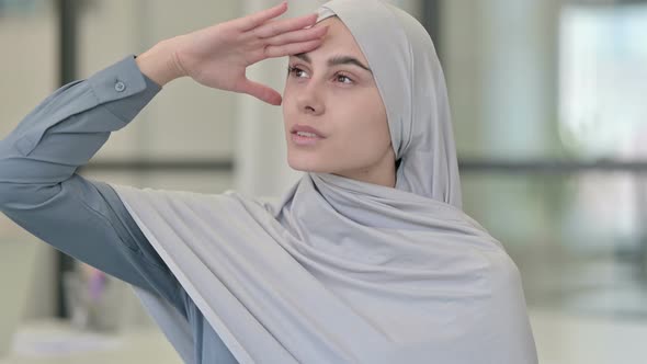 Young Arab Woman Looking Around Searching