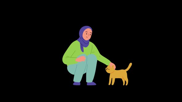 A Muslim girl is stroking a cat 4K