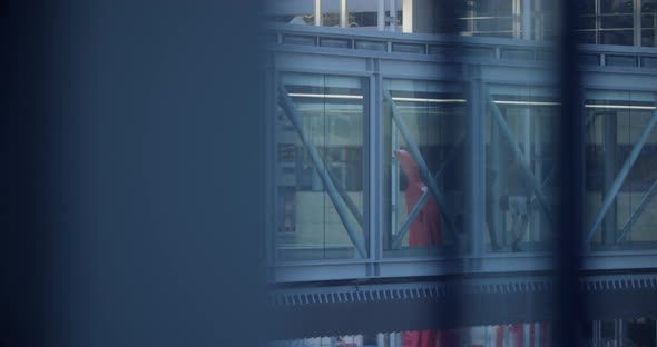 Business people walking together in the corridor at office 4k