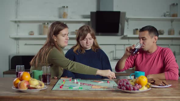 Hearing Impaired People Playing Board Game at Home