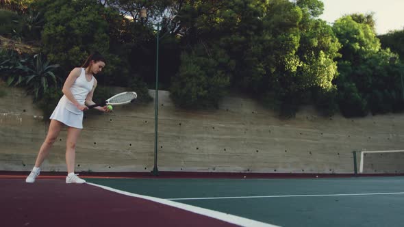 Woman playing tennis on a court