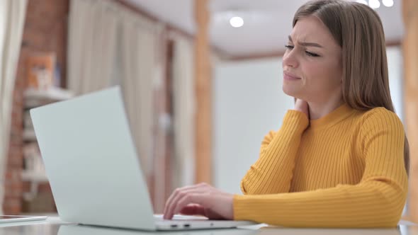 Creative Designer Having Neck Pain in Office