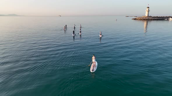 Sup surfing group aerial view 4 K Turkey Alanya