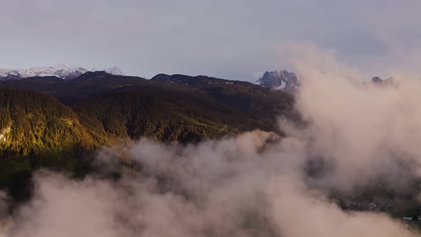 Panoramic View of a Picturesque Mountain Valley with a Village in a Lowland