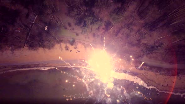 Aerial view of sparkling fireworks display in night sky.