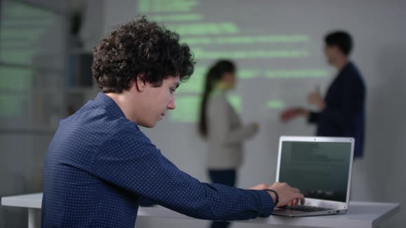 Male IT Class Student With Laptop