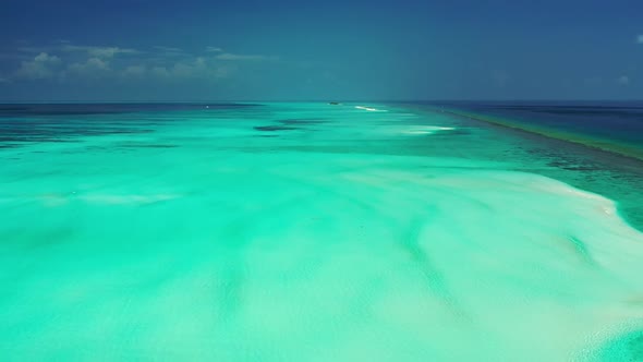 Aerial drone view abstract of relaxing resort beach holiday by blue lagoon with white sandy backgrou