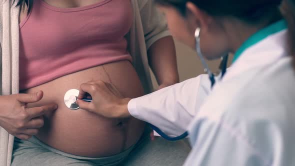 Pregnant Woman and Gynecologist Doctor at Hospital