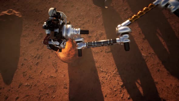 Vehicles on the ground of Mars examining rocks