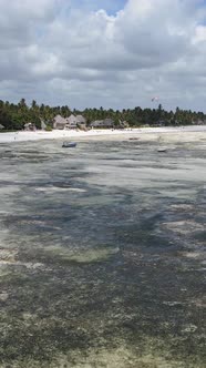 Vertical Video of Low Tide in the Ocean Near the Coast of Zanzibar Tanzania