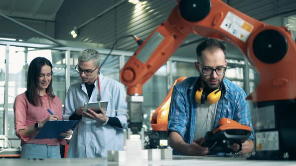 Robotics Students Are Working with High-tech Machines alt