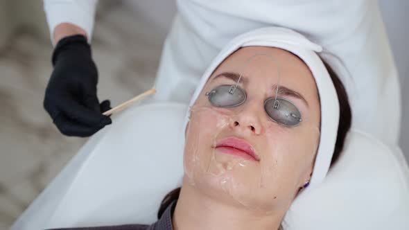 Middleaged Woman in Aesthetic Clinic High Effective Beauty Treatment for Rejuvenation Face Skin